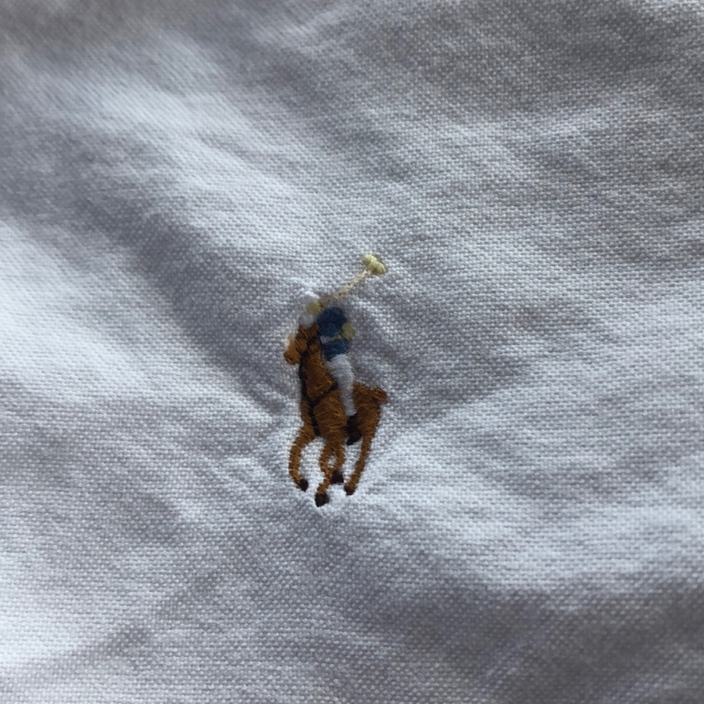 Two Ralph Lauren polo oxford long sleeve shirts.